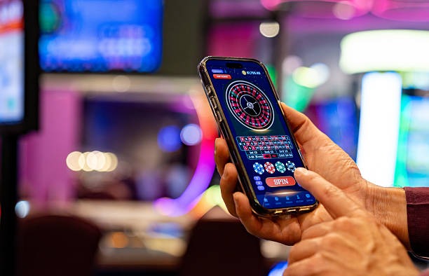 Dealer hands in Andar Bahar live studio, showing card dealing action